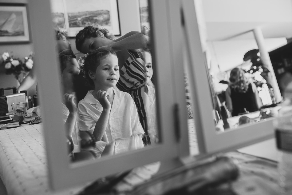 Flower girl getting ready at a wedding in Jersey, Channel Islands