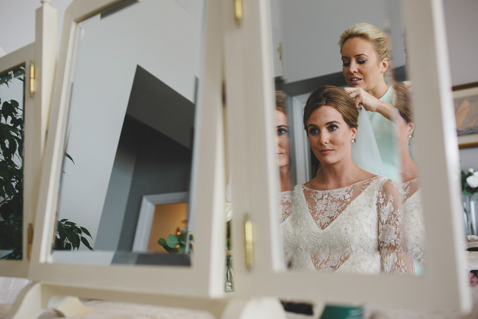 Photo of the bride in the mirror at a wedding in Jersey, Channel Islands