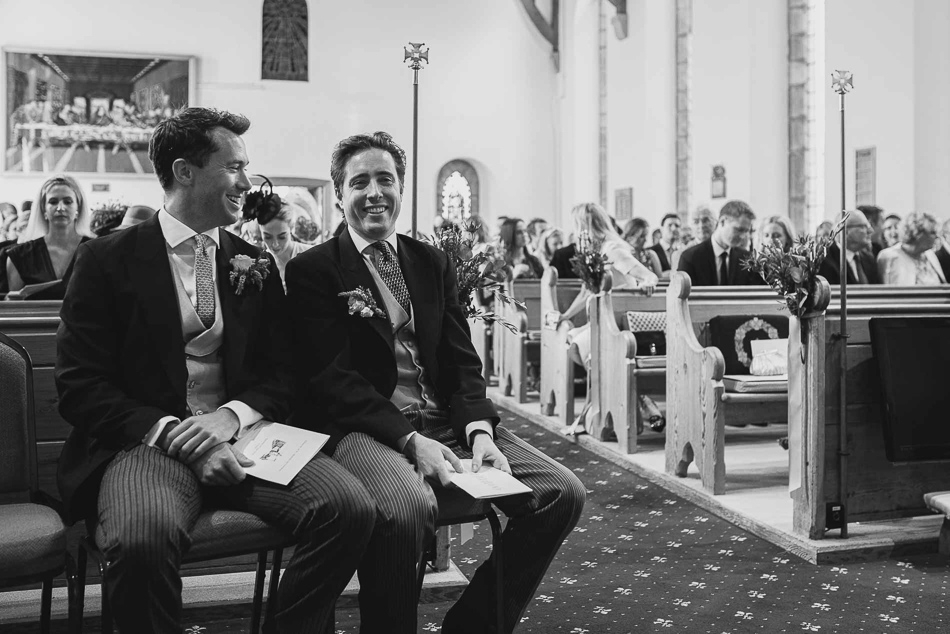 Groom waiting for the bride in church at a wedding in Jersey, Channel Islands