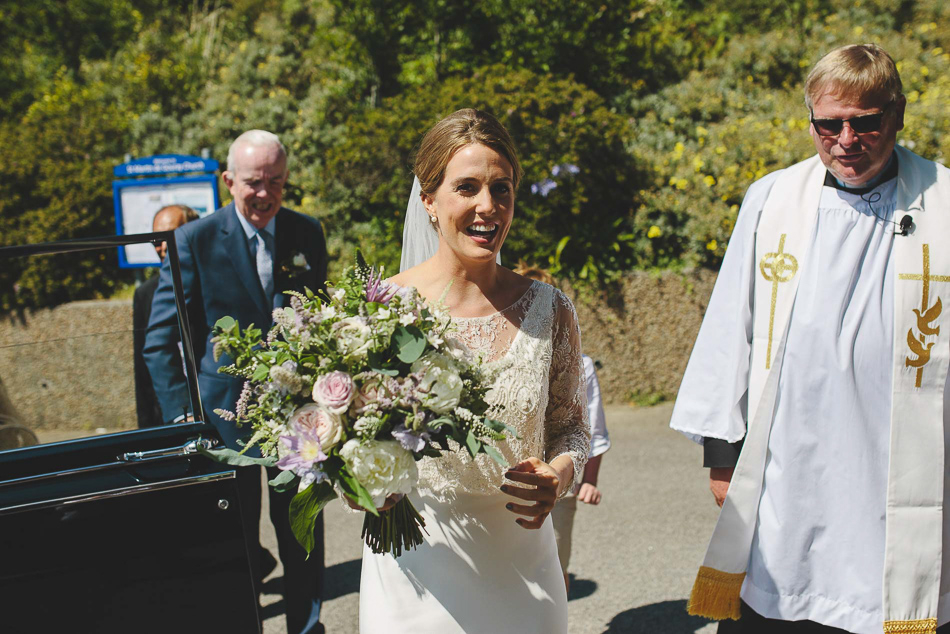 Brides arrival at Gouray church at a wedding in Jersey, Channel Islands