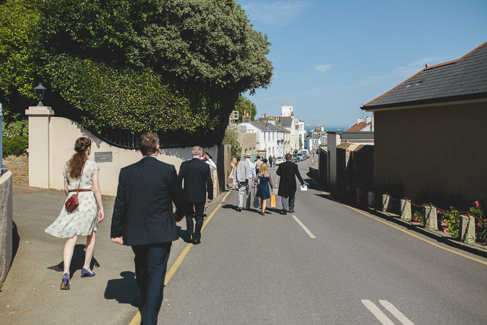 Guests walking to the reception at a wedding in Jersey, Channel Islands