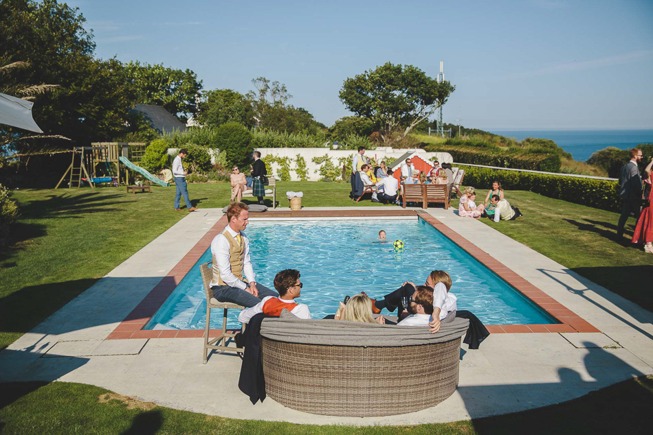 Wedding guests by the pool