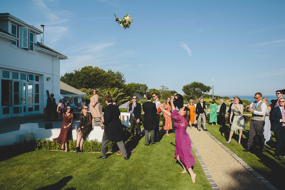 The bouquet toss at a wedding in Jersey, Channel Islands