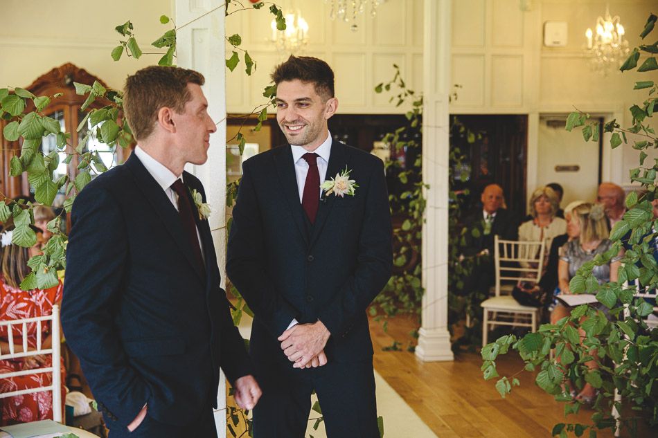 Groom waiting at the ceremony