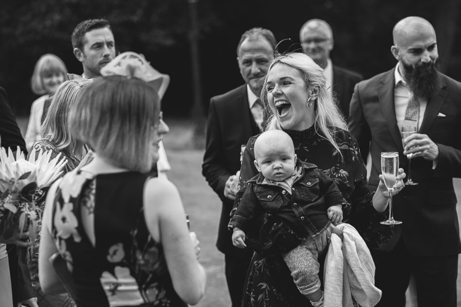 Wedding guest laughing