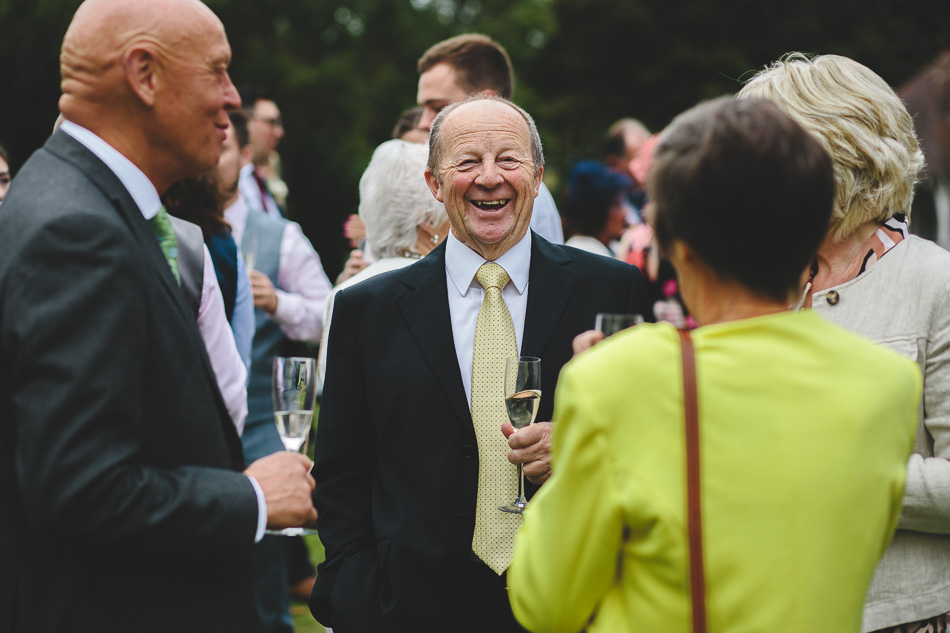 Wedding guest laughing