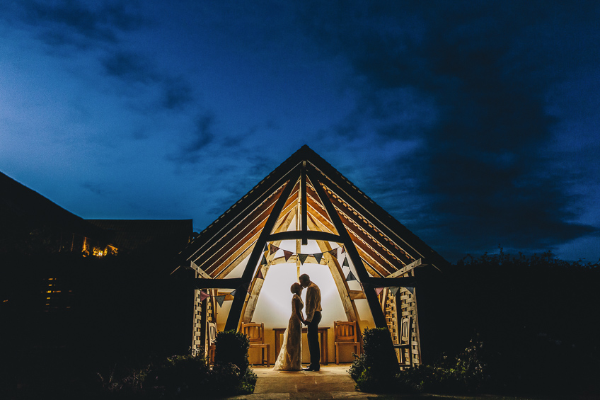 Kingscote barn wedding photography at night