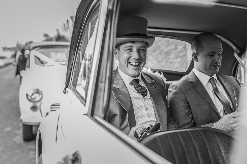 Groom in wedding car