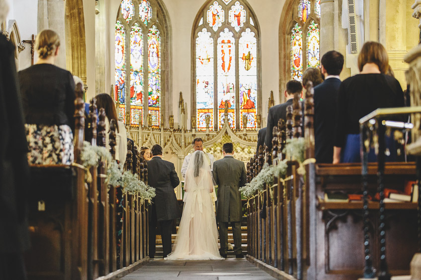 bride and groom during service