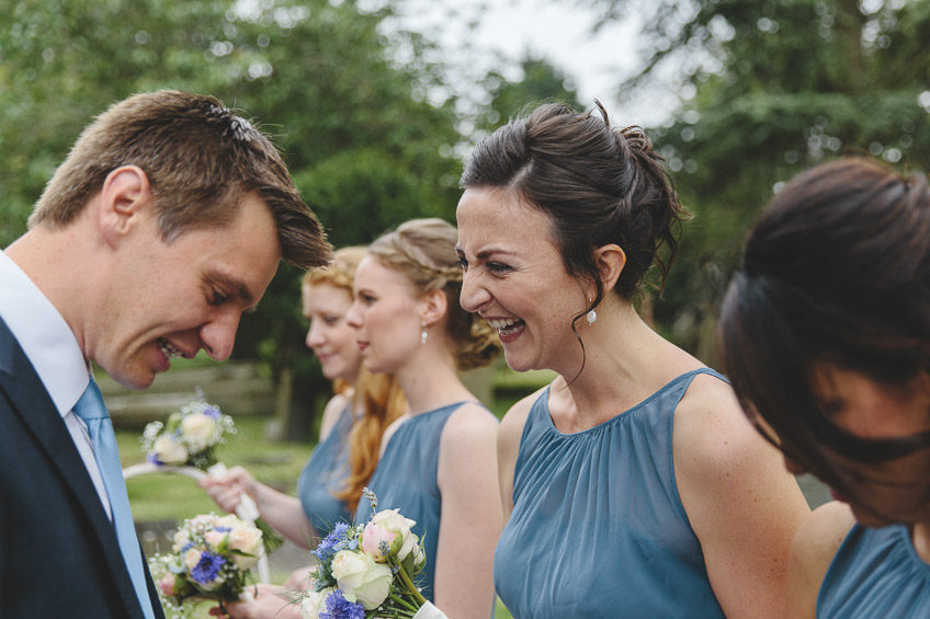 bridesmaid smiling outside church 