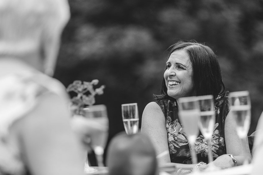 wedding guest smiling