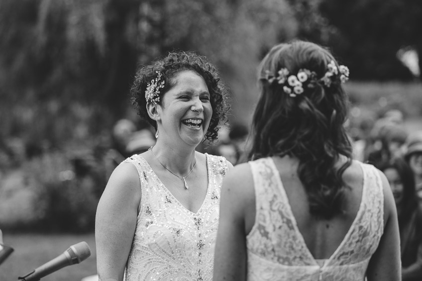 Bride laughing during ceremony
