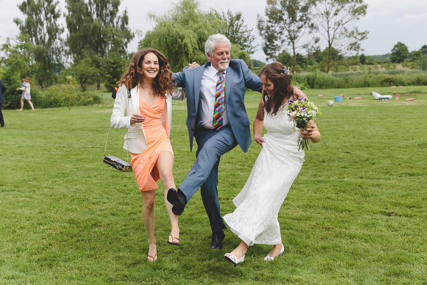 guests dancing in field